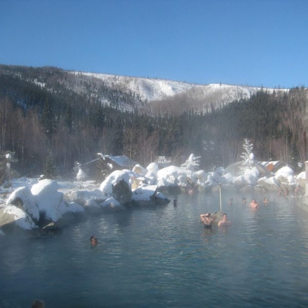 a group of people that are standing in the snow