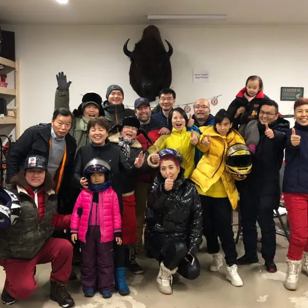 a group of people posing for a photo