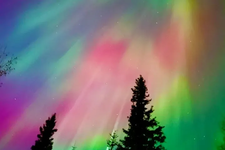 a rainbow in the background