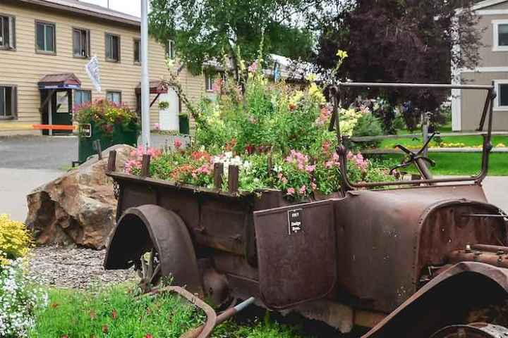 a truck is parked in front of a house