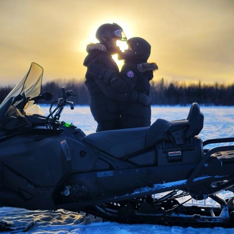 a person sitting on a boat in the water