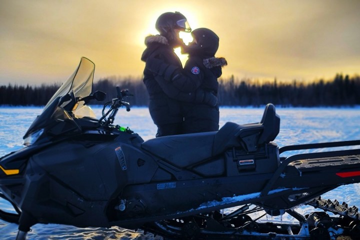a person sitting on a boat in the water