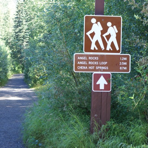 a sign on the side of a road