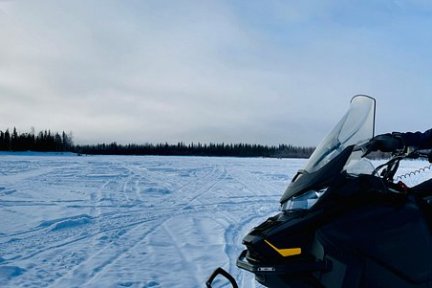 a man with a helmet on the snow