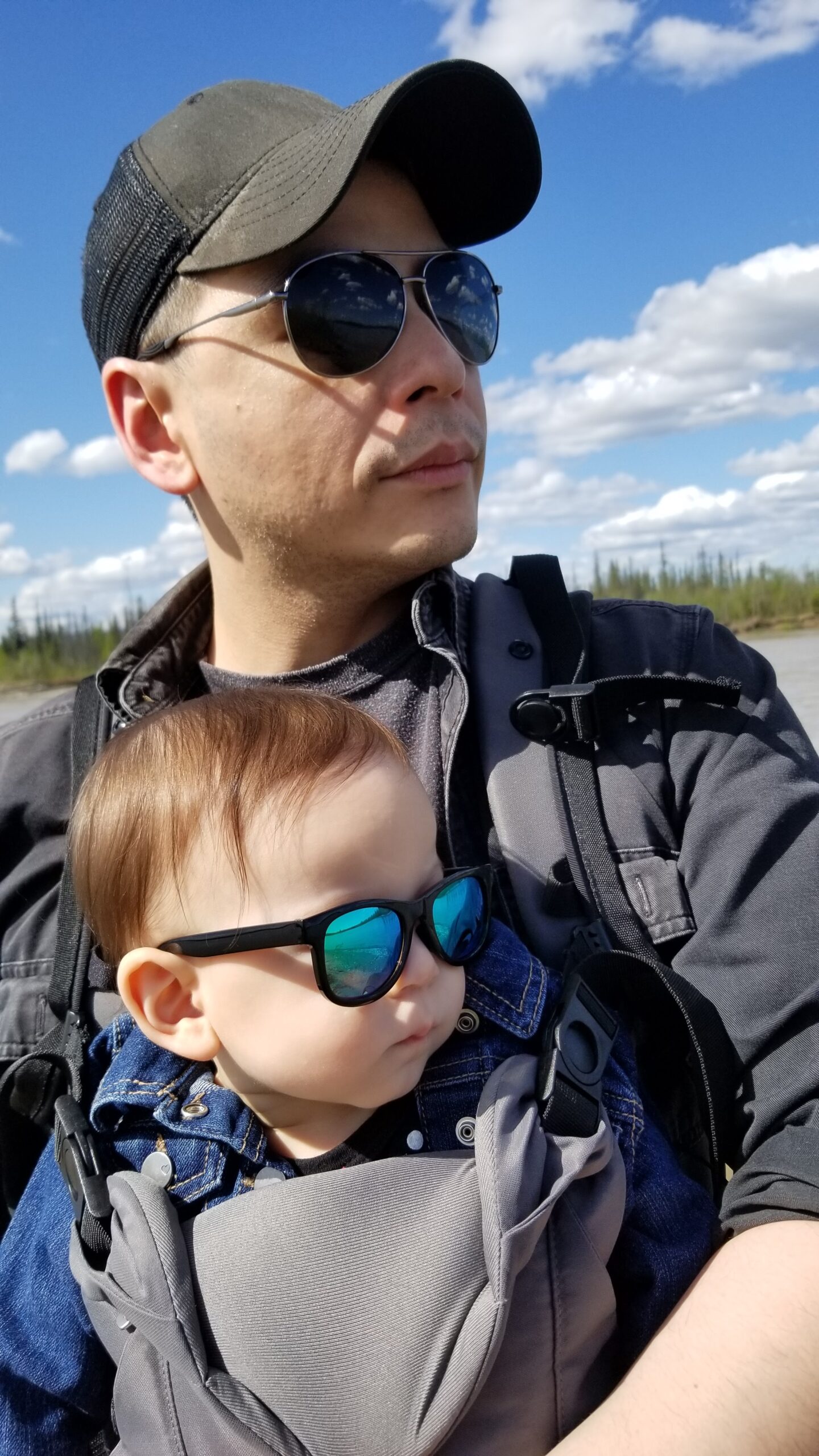 a person wearing sunglasses and a hat